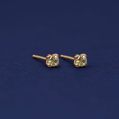 Yellow gold Peridot Earrings shown with 14k solid gold pushback post with no backings