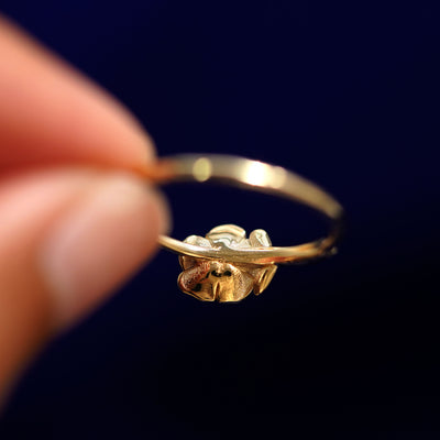 Underside view of a solid 14k gold Rose Ring