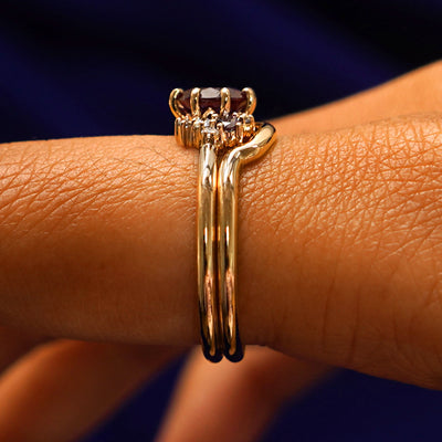 Alternate side view of an Alexandrite Cluster Ring Set on a model's finger