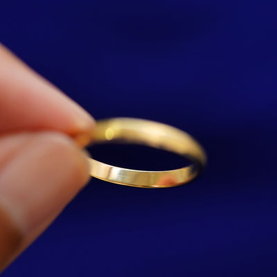 Underside view of a solid 14k gold Beveled Edge Band