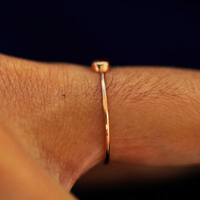 Side view of a Citrine Ring on a model's finger