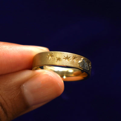 Alternate side view of a Cloud Diamond Band showing hand etched stars halfway down the band