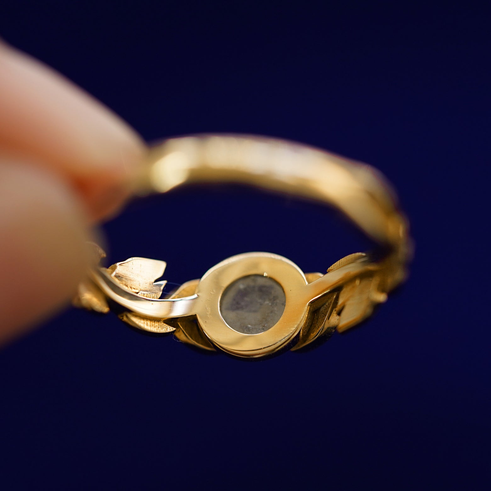 Underside view of a solid 14k gold Diamond Leaves Ring