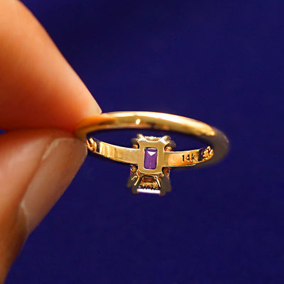 Underside view of a solid 14k gold Emerald Cut Pink Sapphire Ring