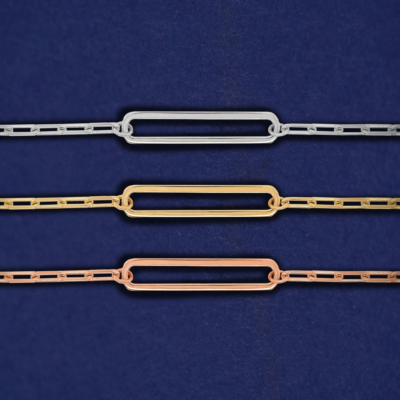 Three Floating Oval Bracelets shown in options of rose, yellow, and white gold