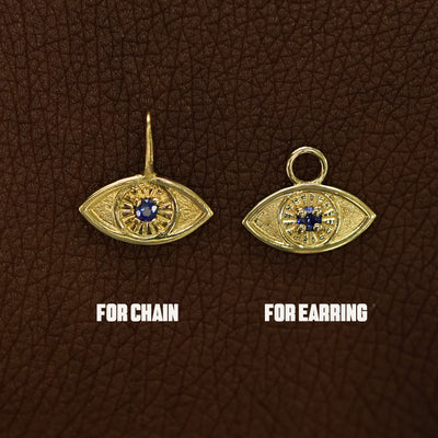 Two 14 karat solid gold blue sapphire Evil Eye Charms shown in the For Chain and For Earring options