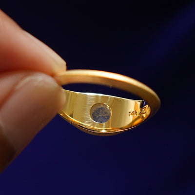 Underside view of a solid 14k gold Cushion Salt and Pepper Diamond Signet Ring