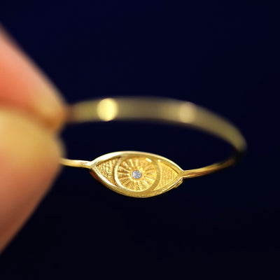 Underside view of a solid 14k gold Diamond Evil Eye Ring