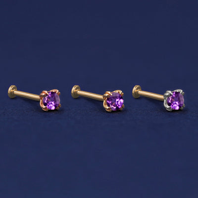 Three versions of the Amethyst Flat Back Earring shown in options of rose, yellow, and white gold