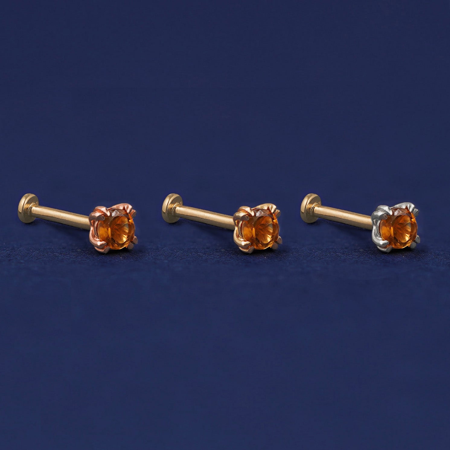 Three versions of the Citrine Flat Back Earring shown in options of rose, yellow, and white gold