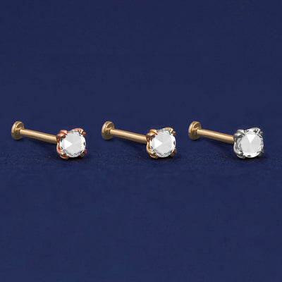 Three versions of the Rose Cut Diamond Flat Back Earring shown in options of rose, yellow, and white gold
