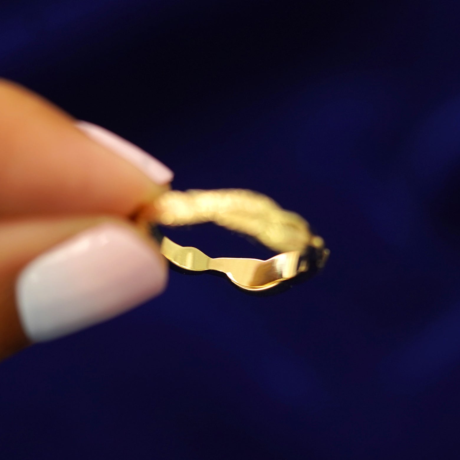 Underside view of a solid 14k gold Thick Leaves Band