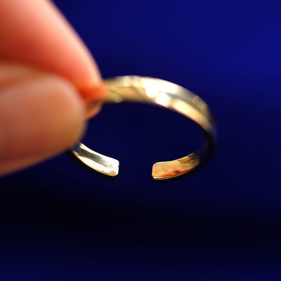 Underside view of a solid 14k gold Open Industrial Band