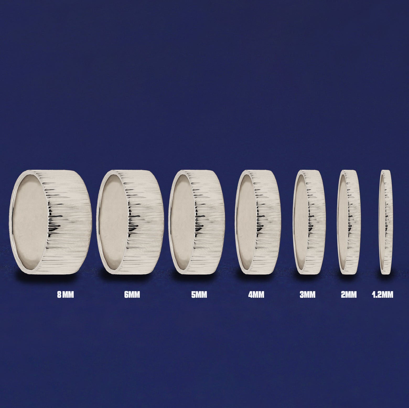 Seven versions of the Platinum Industrial Wood Band showing the different thickness options of the ring from 8mm to 1.2mm