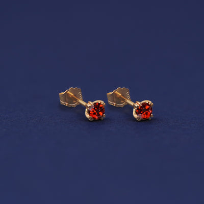 Yellow gold Garnet Earrings shown with 14k solid gold pushback backings
