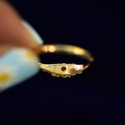 Underside view of a solid 14k gold Green Diamond Leaves Ring