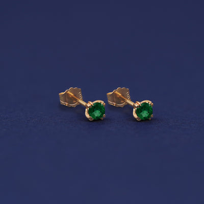 Yellow gold Emerald Earrings shown with 14k solid gold pushback backings