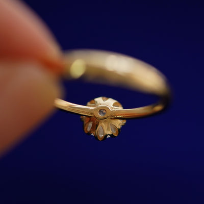 Underside view of a solid 14k gold Diamond Petal Ring