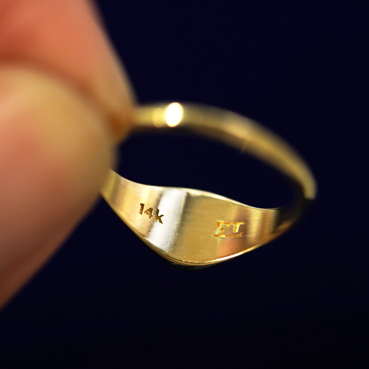 Underside view of a solid 14k gold Signet Ring