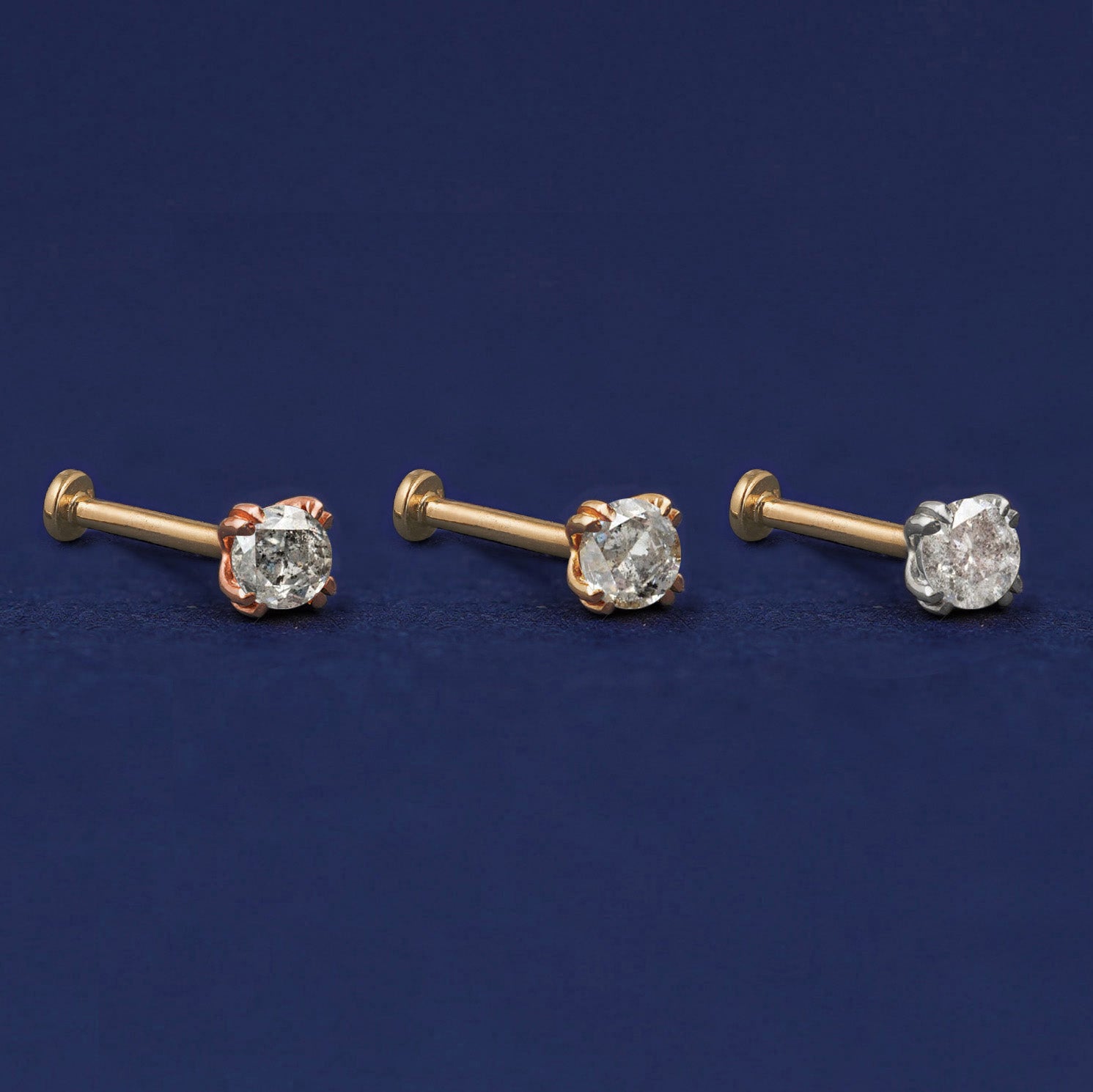 Three versions of the Salt and Pepper Diamond Flat Back Earring shown in options of rose, yellow, and white gold