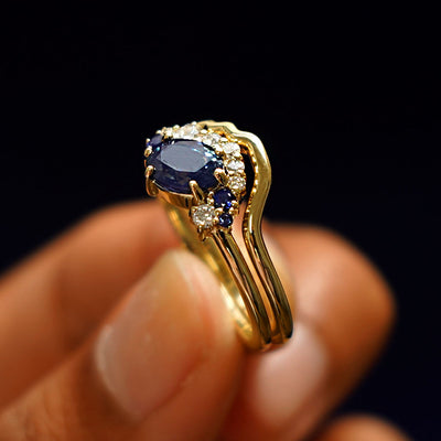 Side view of an Sapphire and Diamond Cluster Ring Set to show detail