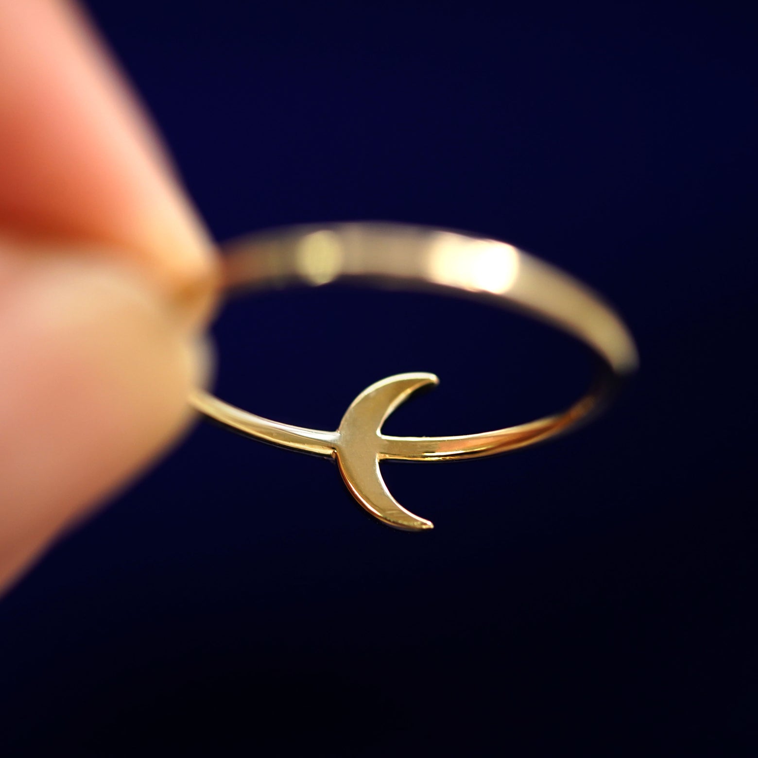 Underside view of a solid 14k gold Moon Ring