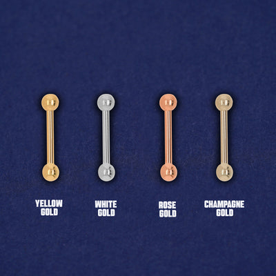 Four versions of the Small Straight Barbell Piercing in yellow, white, rose and champagne gold