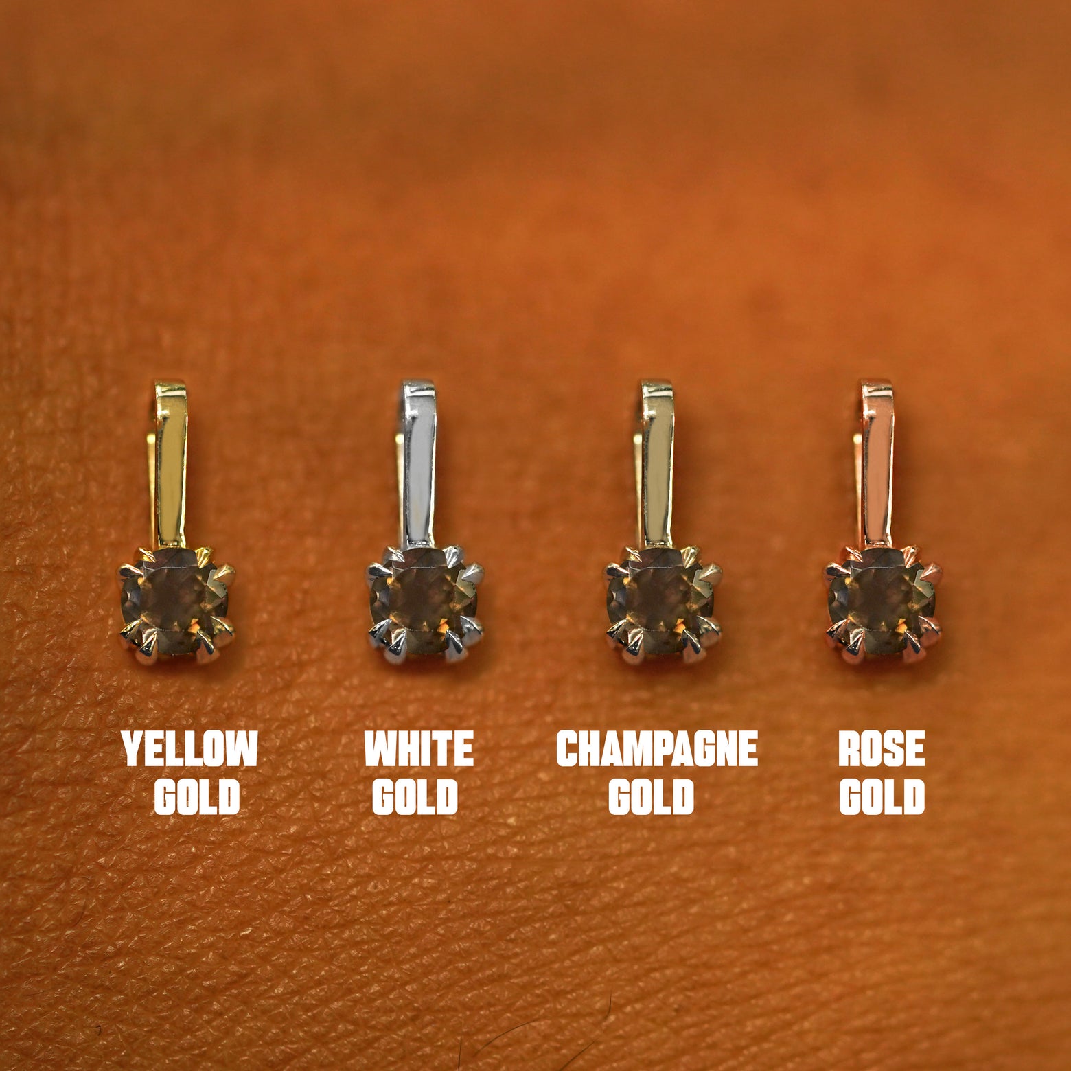 Four versions of the Smoky Quartz Charm shown in options of yellow, white, rose, and champagne gold