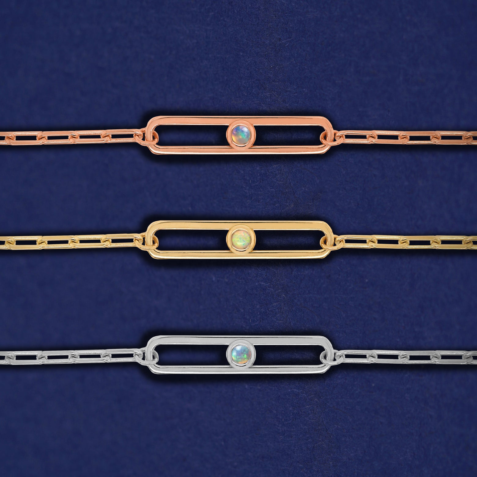 Three one-stone Dancing Gemstone bracelets shown in options of rose, yellow, and white gold