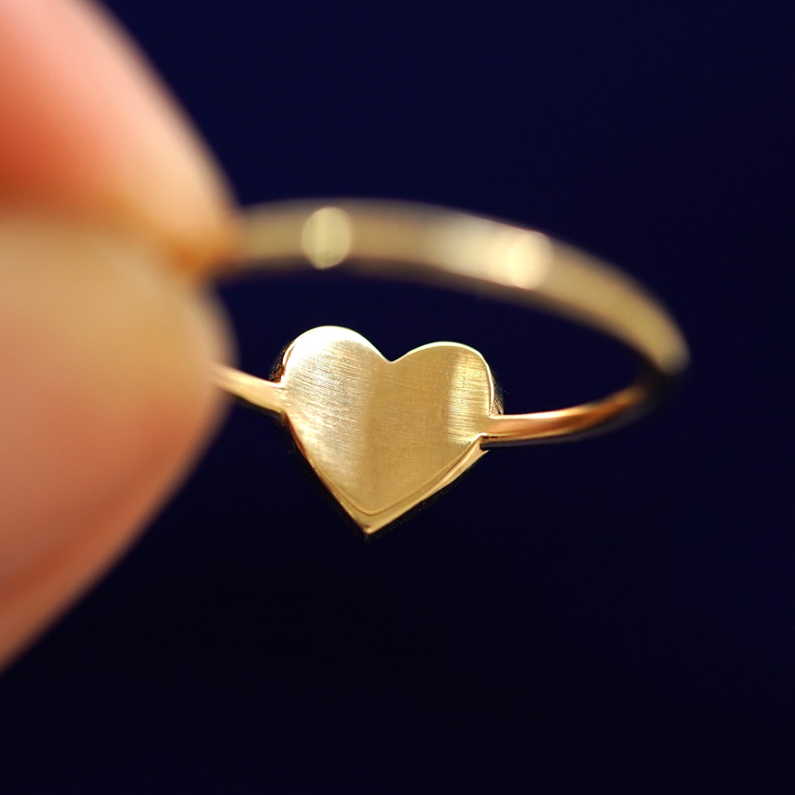 Underside view of a solid 14k gold Enamel Heart Ring