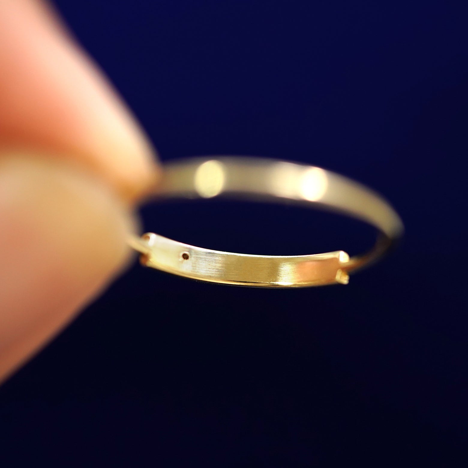 Underside view of a solid 14k gold Diamond Gemstone Bar Ring