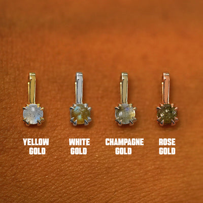 Four versions of the Labradorite Charm shown in options of yellow, white, rose, and champagne gold