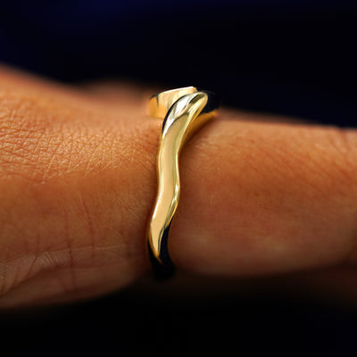 Side view of a Marquise Lab Diamond Melted Ring on a model's finger to show details