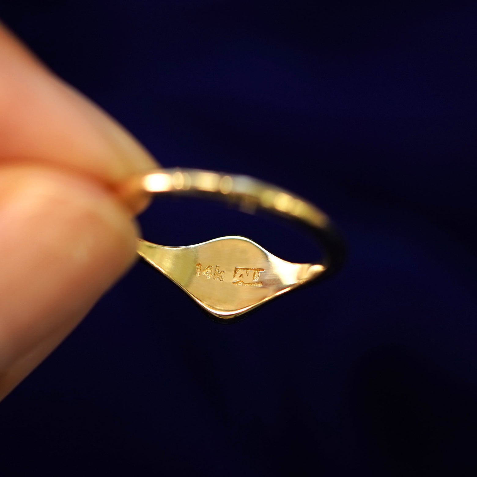 Underside view of a solid 14k gold Oval Signet Ring