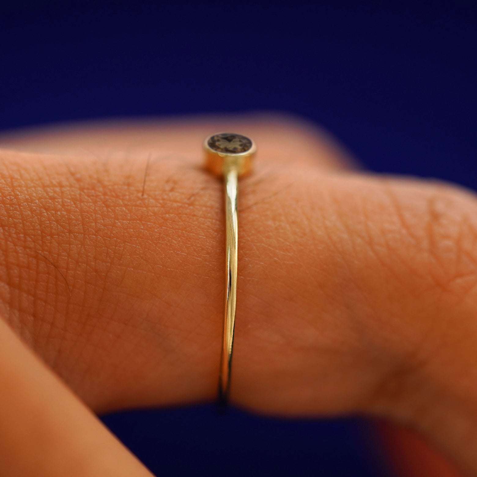 Side view of a Smoky Quartz Ring on a model's finger