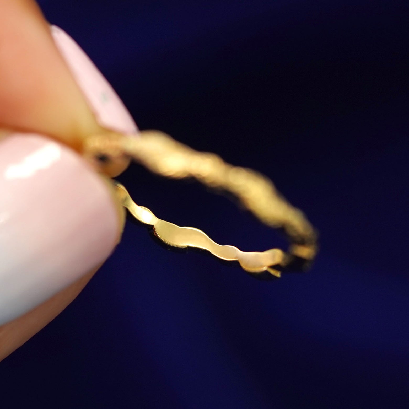 Underside view of a solid 14k gold Thin Leaves Band