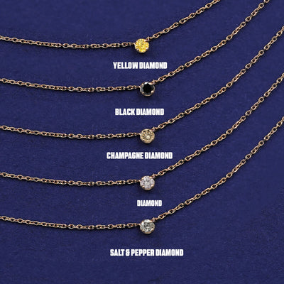Five versions of the yellow gold Cable Necklace showing Yellow, Black, Champagne, Clear, and Salt and Pepper diamonds