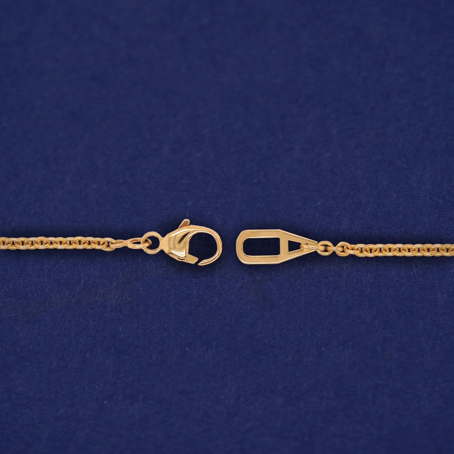 Close up view of an unclasped AU lobster claw clasp on a Bound Together Necklace