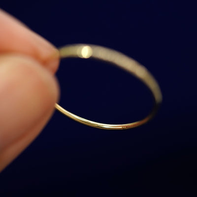 Underside view of a solid 14k gold Shimmer Ring