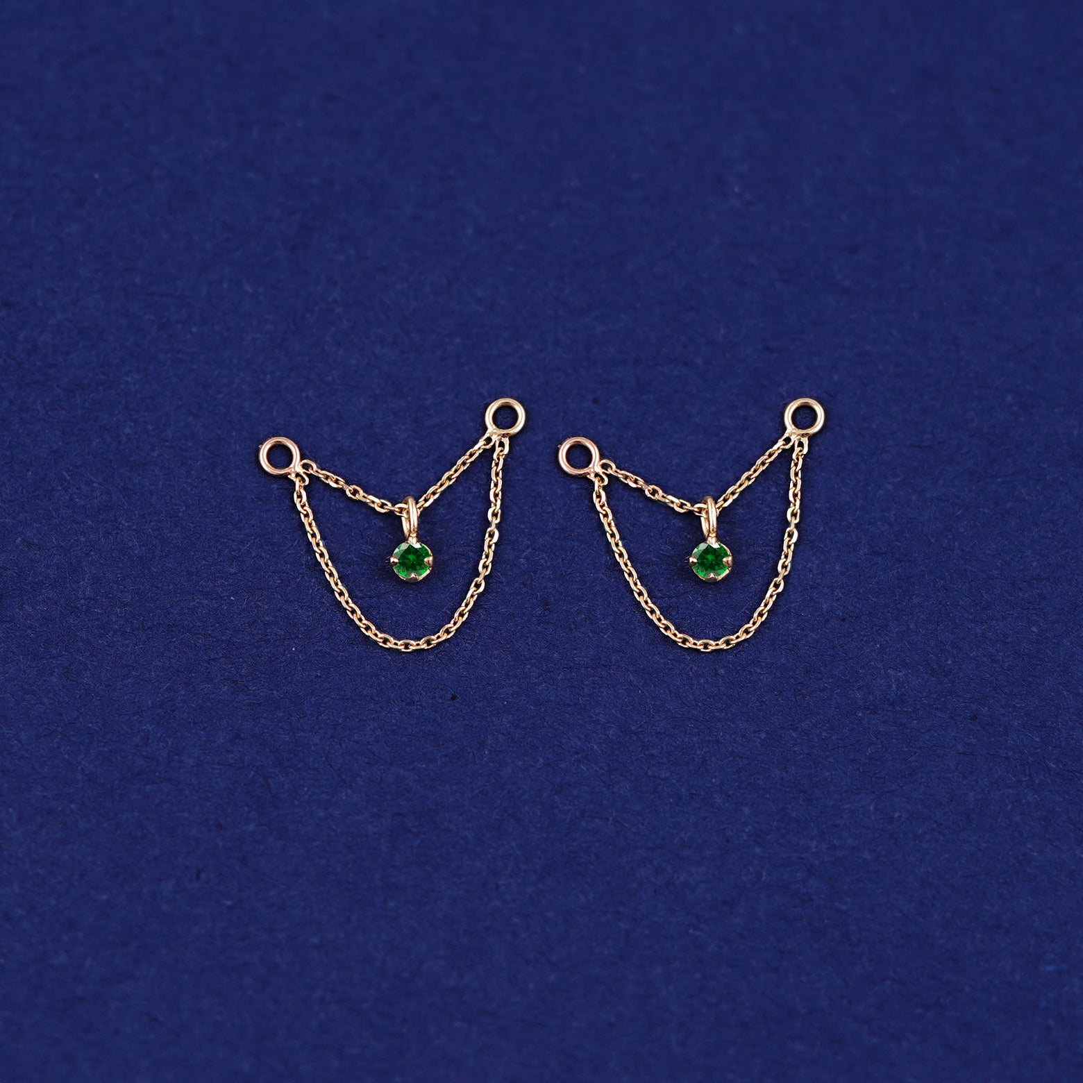 A pair of 14 karat solid gold emerald Cable Chain Connector earrings