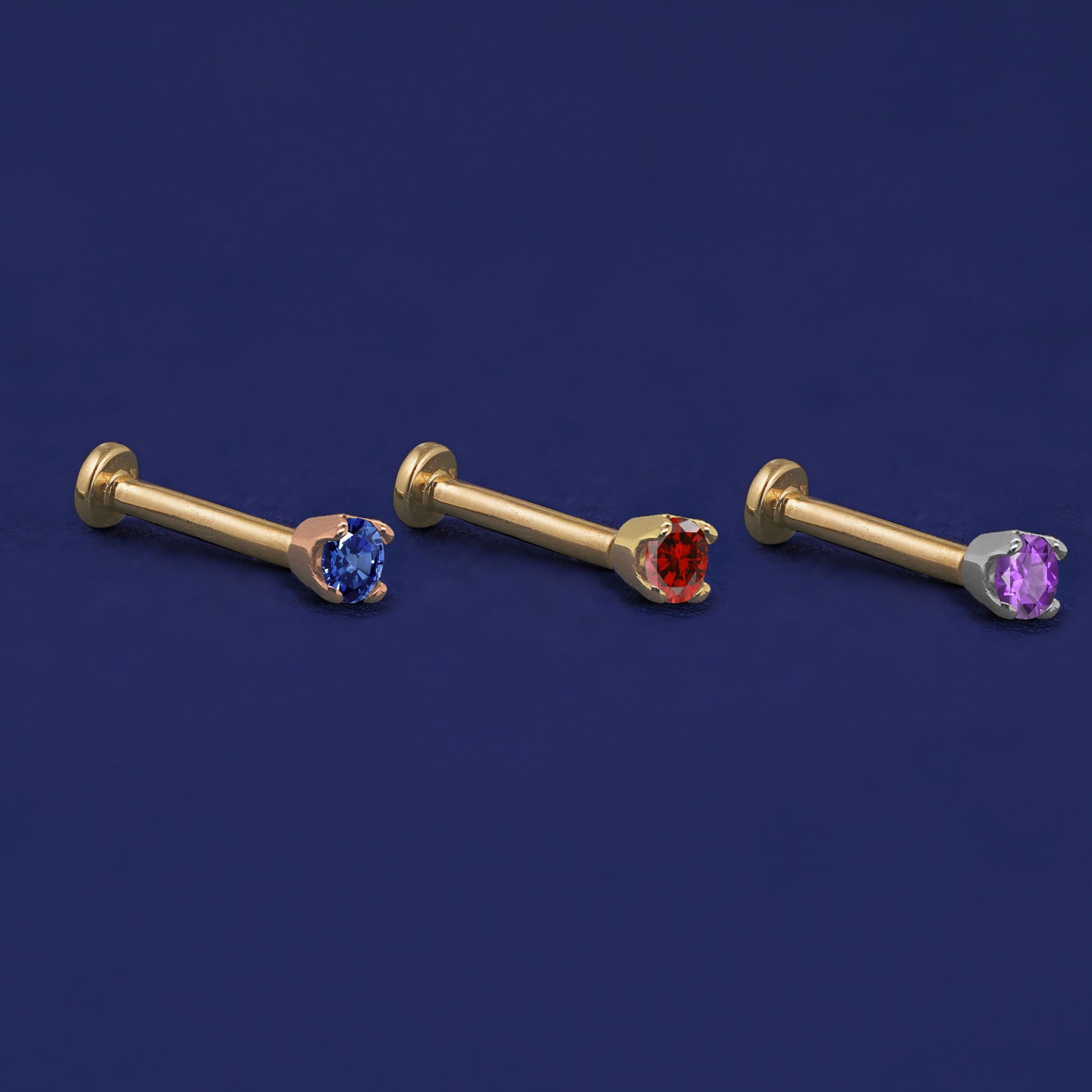 Three versions of the 2mm Gemstone Flat Back Earring shown in options of rose, yellow, and white gold