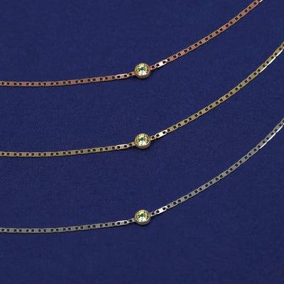Three Peridot Bracelets shown in options of rose, yellow, and white gold