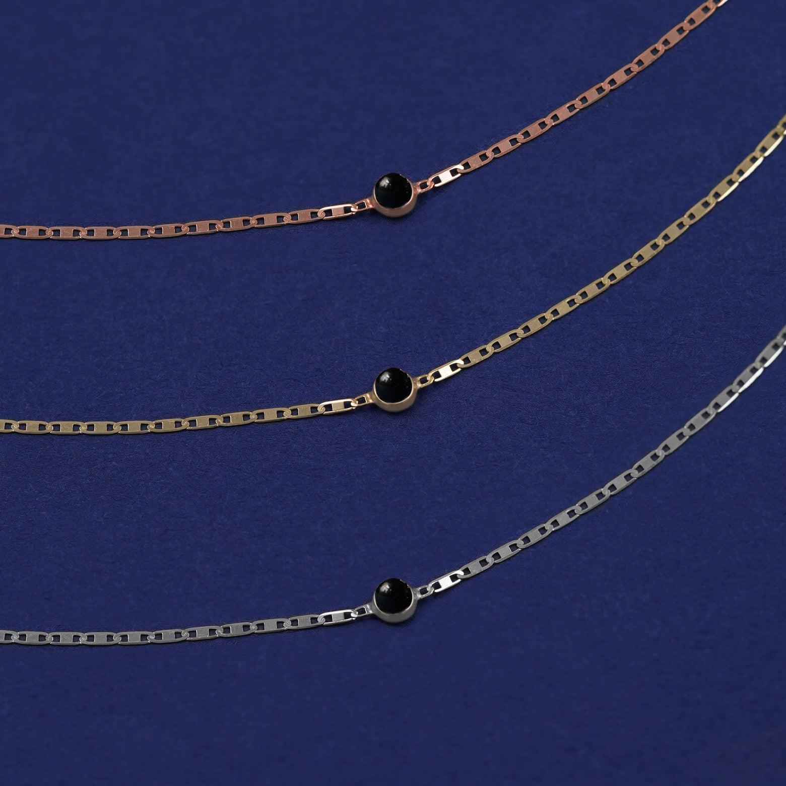 Three Onyx Bracelets shown in options of rose, yellow, and white gold