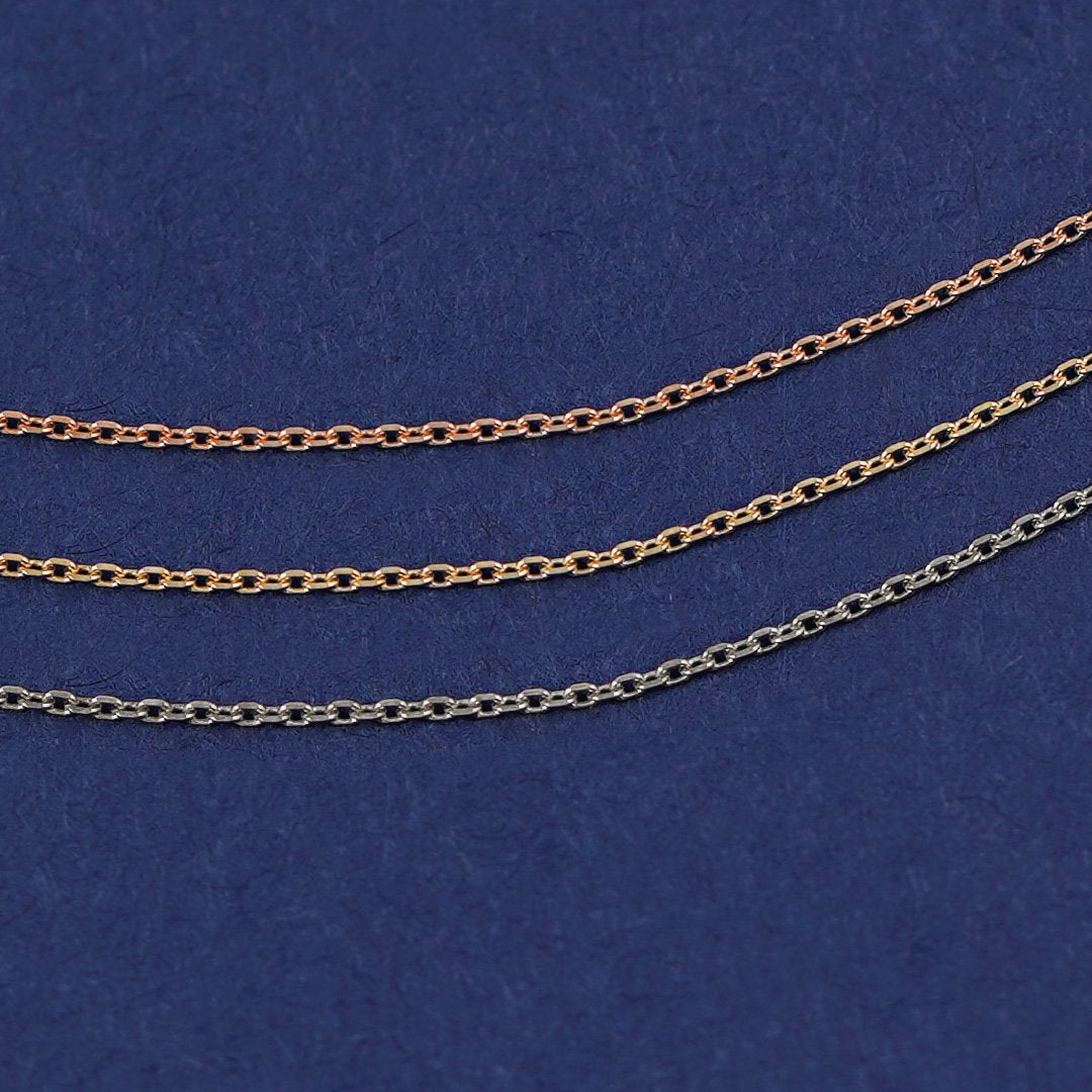 Three Infinity Cable Chains shown in options of rose, yellow, and white gold