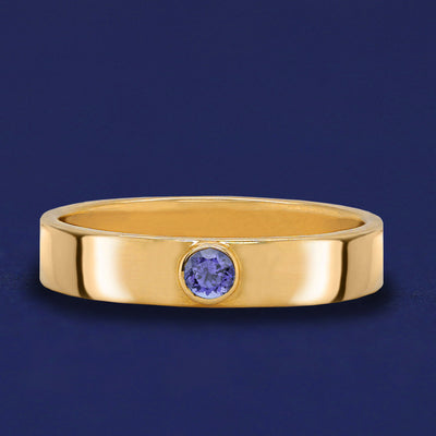 A solid yellow gold Tanzanite Gemstone Industrial ring