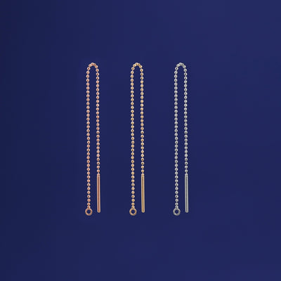 Three versions of the Extender shown in options of rose, yellow, and white gold