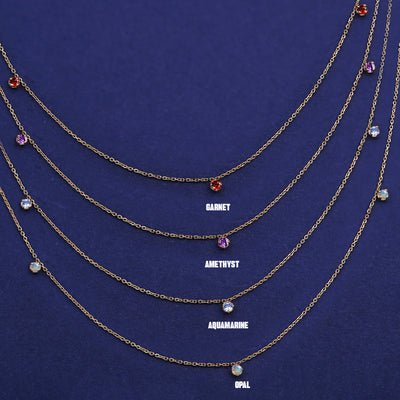 Six versions of the solid yellow gold Gemstone Cable Necklace showing different stone options