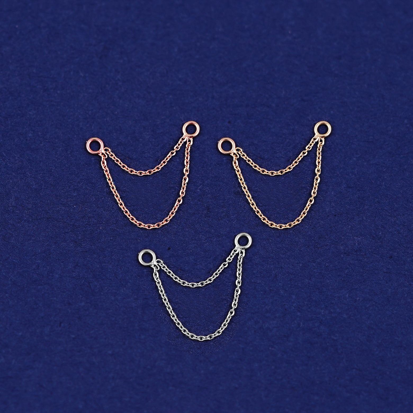 Three versions of the Cable Chain Connector shown in options of rose, yellow, and white gold