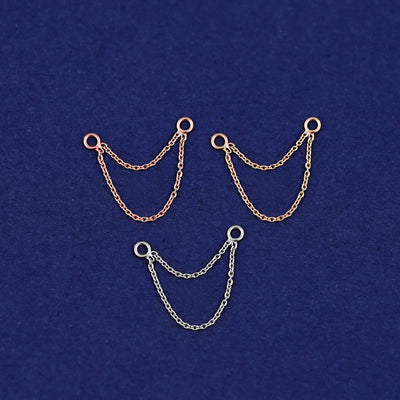 Three versions of the Cable Chain Connector shown in options of rose, yellow, and white gold