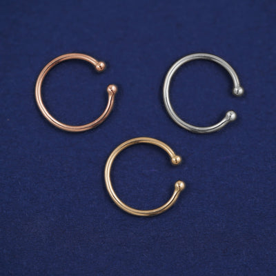 Three versions of the Line Cuff shown in options of rose, white, and yellow gold